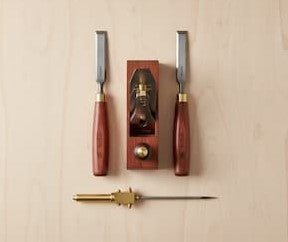 picture of tools on a light wood effect background