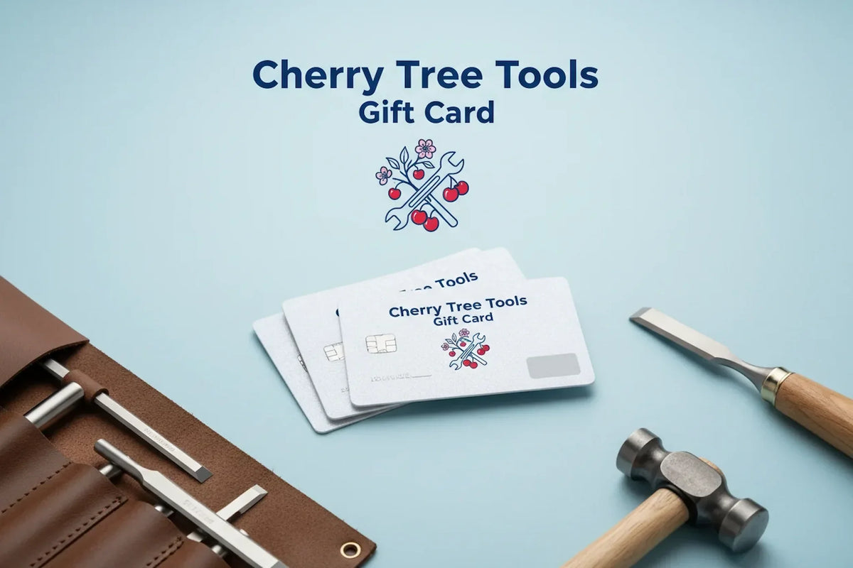 Tools and gift cards arranged on a flat pale blue surface