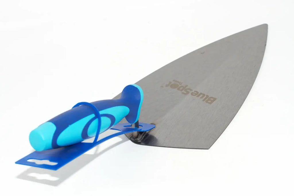 Blue Spot 11" brick trowel broad heel with a grey metal blade and a blue and turquoise handle, resting on a blue plastic stand against a white background. The blade has the brand name 'Blue Spot' printed on it.