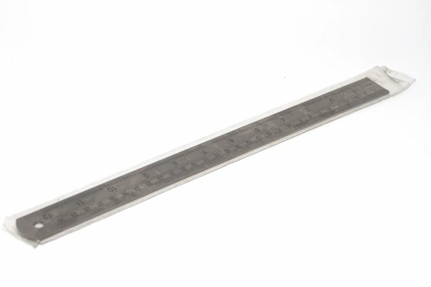 Fisher 300mm Stainless Steel Ruler - 12" with dual-scale design, featuring imperial and metric measurements.