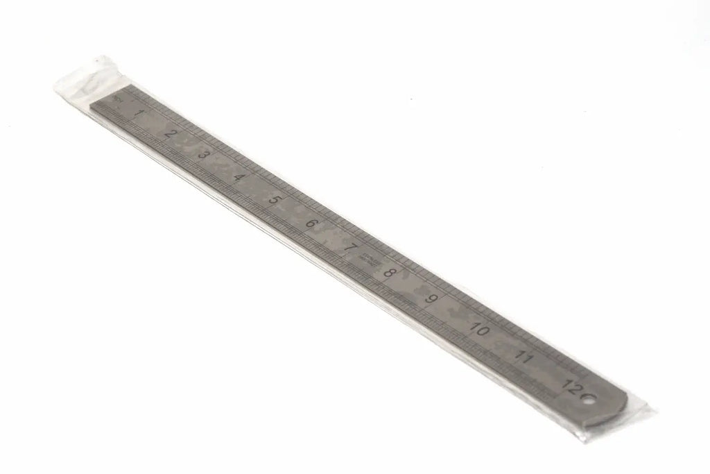 Fisher 300mm Stainless Steel Ruler in packaging showing dual-scale measurements up to 12 inches.