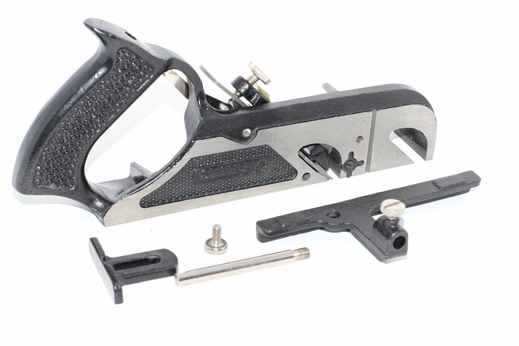 Stanley Duplex Rebate Plane No 078 shown with its mounting hardware, including a black mounting bracket, a silver adjustment screw, and a silver rod, on a plain white background.