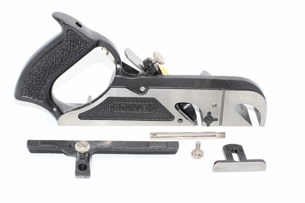 Stanley Duplex Rebate Plane No 078 with its accessories, including a square, a pin, a screw, and a spacer, displayed on a clean white background.