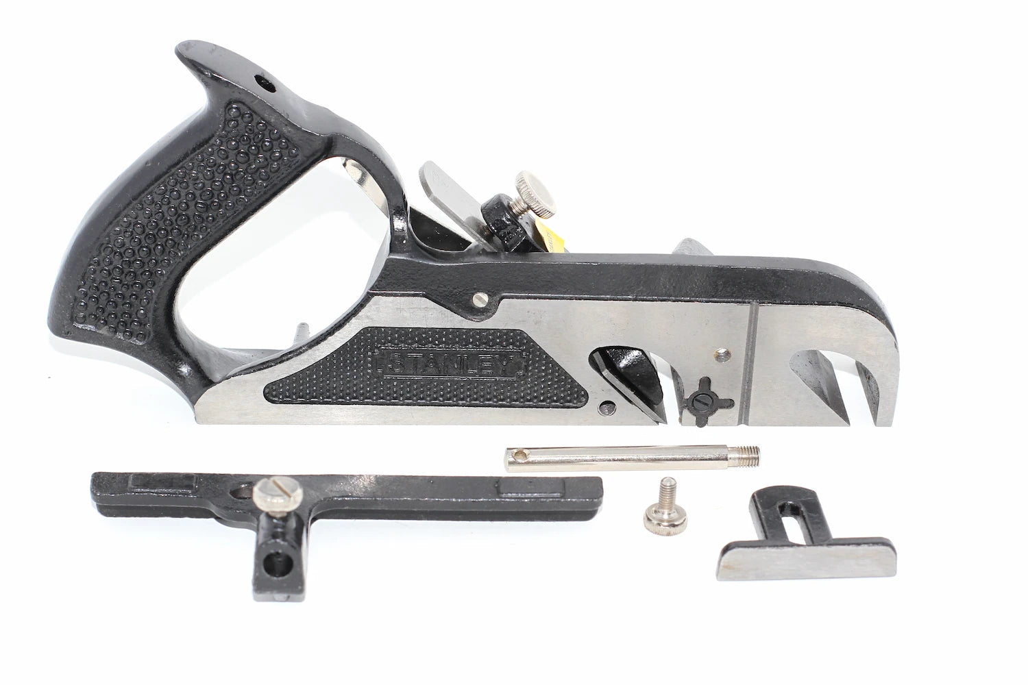 Stanley Duplex Rebate Plane No 078 with its accessories, including a square, a pin, a screw, and a spacer, displayed on a clean white background.