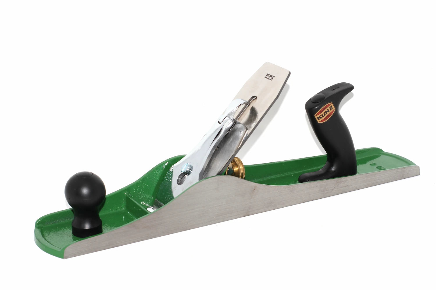 Kunz no 6 fore plane corrugated sole with a green painted metal body, silver steel blade, black knobs, and a brass adjustment screw, shown on a plain white background.