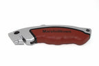 Marshalltown Durasoft Utility Knife side view, featuring a red ergonomic handle and retractable blade.