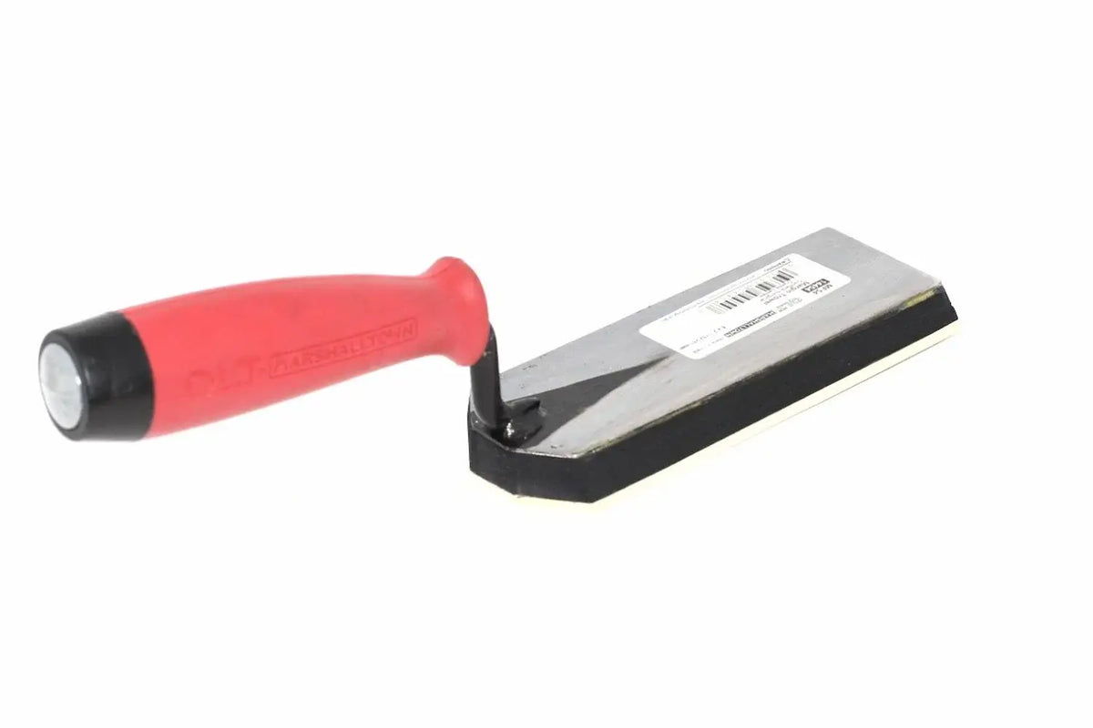 Marshalltown QLT 6" margin trowel from Cherry Tree Tools with a red handle, gum rubber face and tempered steel backing.