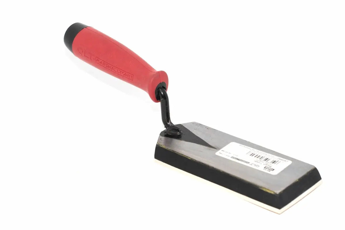 Marshalltown QLT 6" margin trowel from Cherry Tree Tools with a red handle and gum rubber face with tempered steel