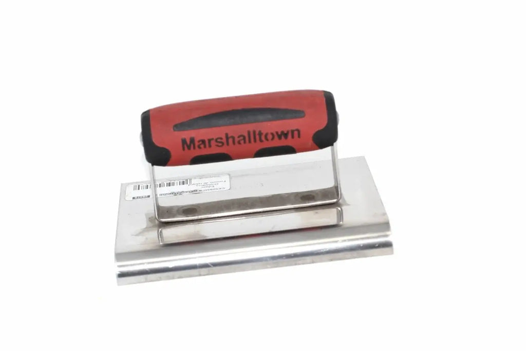 Marshalltown Edging Trowel from Cherry Tree Tools with a red and black handle and polished stainless steel blade.