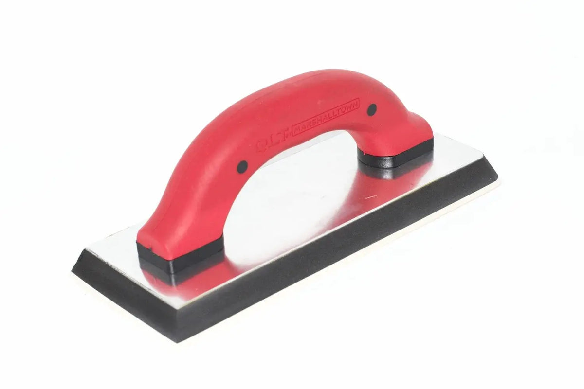 Marshalltown QLT grout float from Cherry Tree Tools, red with a durable rubber pad and tempered steel backing.