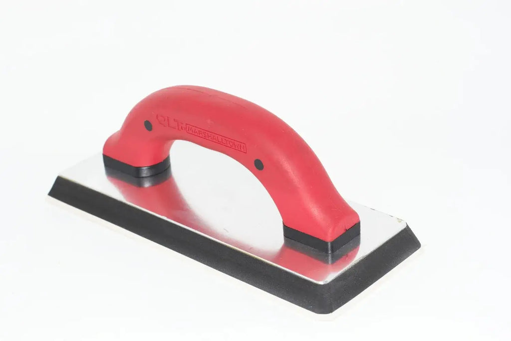 Cherry Tree Tools Marshalltown QLT grout float in red with a durable rubber pad and tempered steel backing, 9 inch by 4 inch.