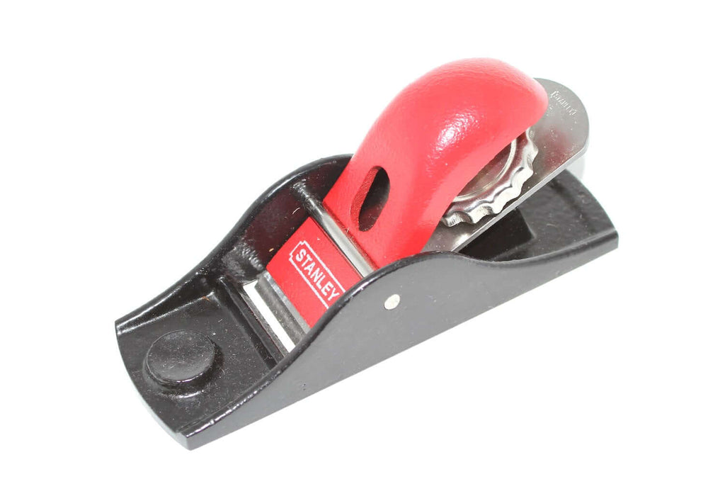 Stanley No 102 Low Angle Block Plane with a red handle, perfect for precision woodworking tasks.