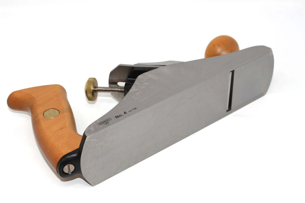 Stanley Bailey Sweetheart No4 Hand Plane with cherry wood handle and precision blade for woodworking.