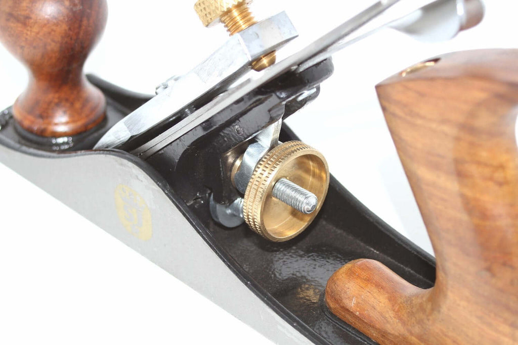 Close-up of the adjustment mechanism of the Spear & Jackson No 3 Smoothing Plane, showcasing precision brass components.