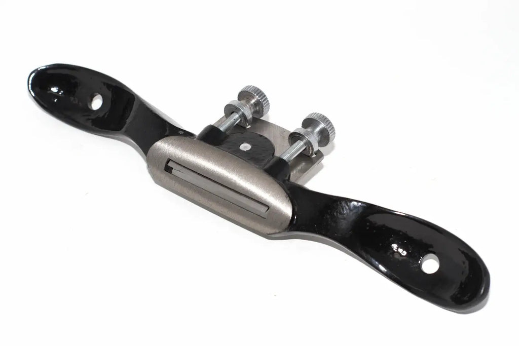 Spear & Jackson Round Spokeshave, featuring an ergonomic handle and adjustable carbon steel blade for precision woodworking.