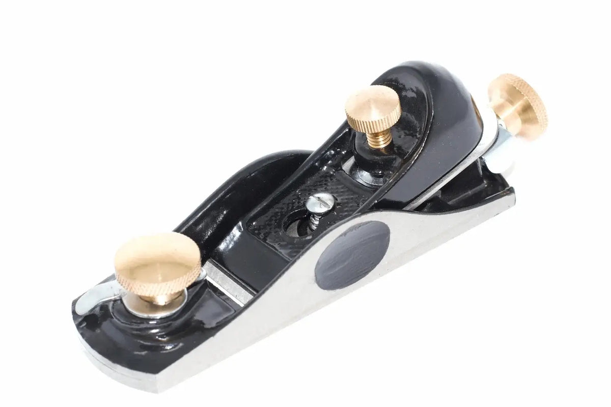 Spear & Jackson Block Plane 6 1/2 by Cherry Tree Tools, black and silver block plane with brass adjusters