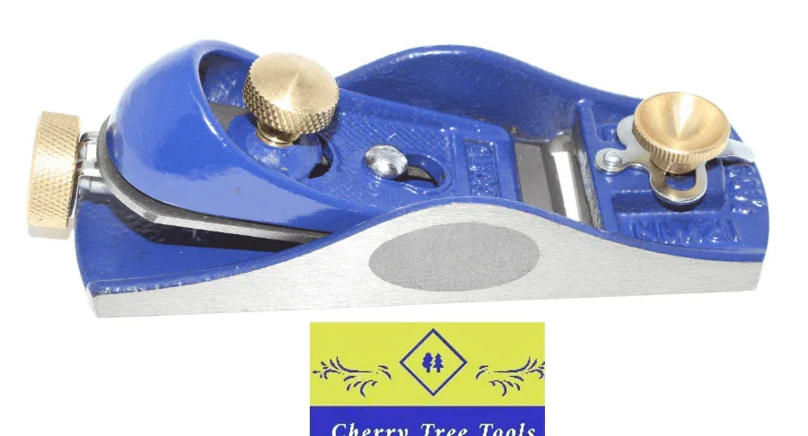 Irwin Record Block Plane No 60 1/2 with brass knobs on a blue and silver body, designed for precision woodworking.