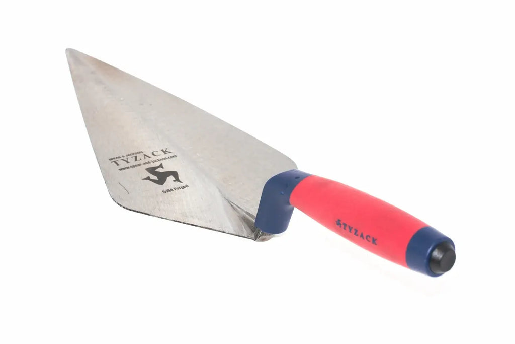 A spear & Jackson Tyzack brick trowel with a silver steel blade and a red and blue handle, shown on a plain white background.