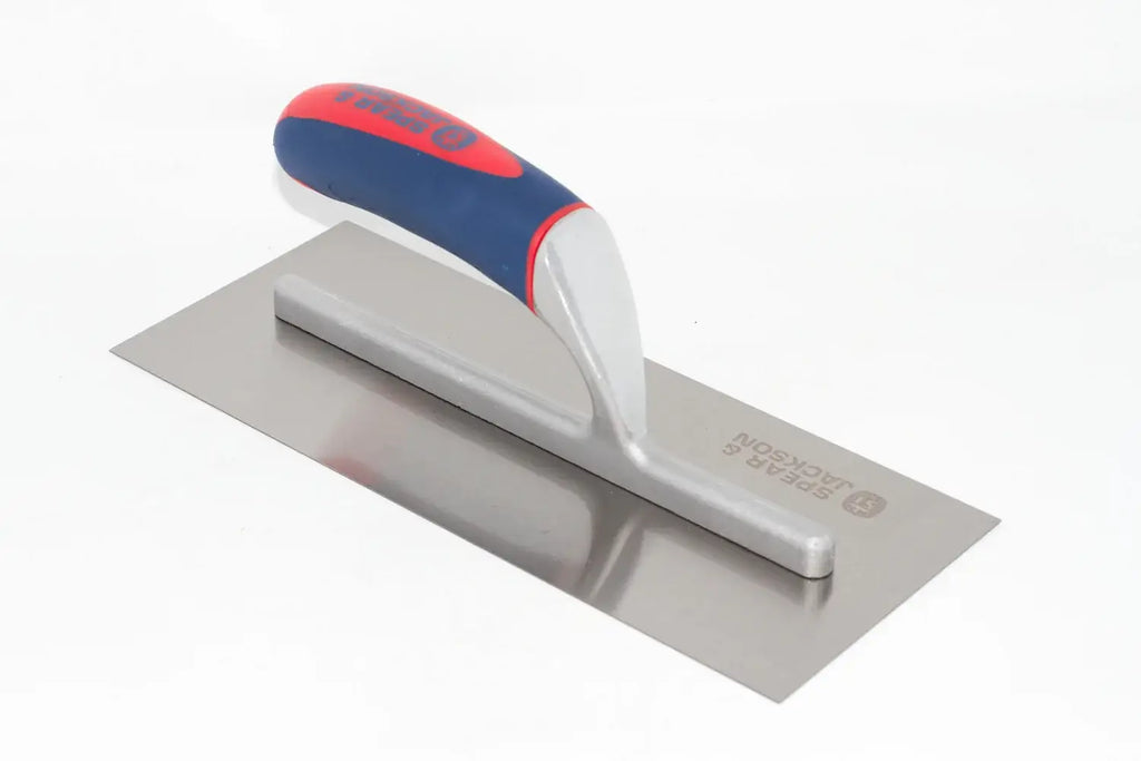 Spear & Jackson plastering trowel with a blue, red, and white ergonomic handle, shown on a plain white background.