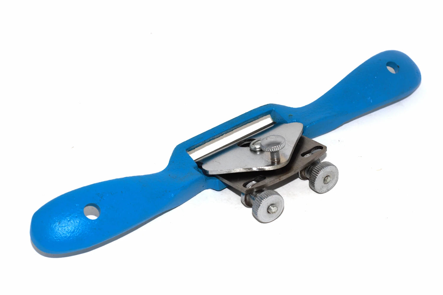Silverline Convex spokeshave 250mm showing the two depth of cut adjuster screws and a polished silver metal chip breaker